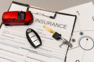 car insurance form with car key